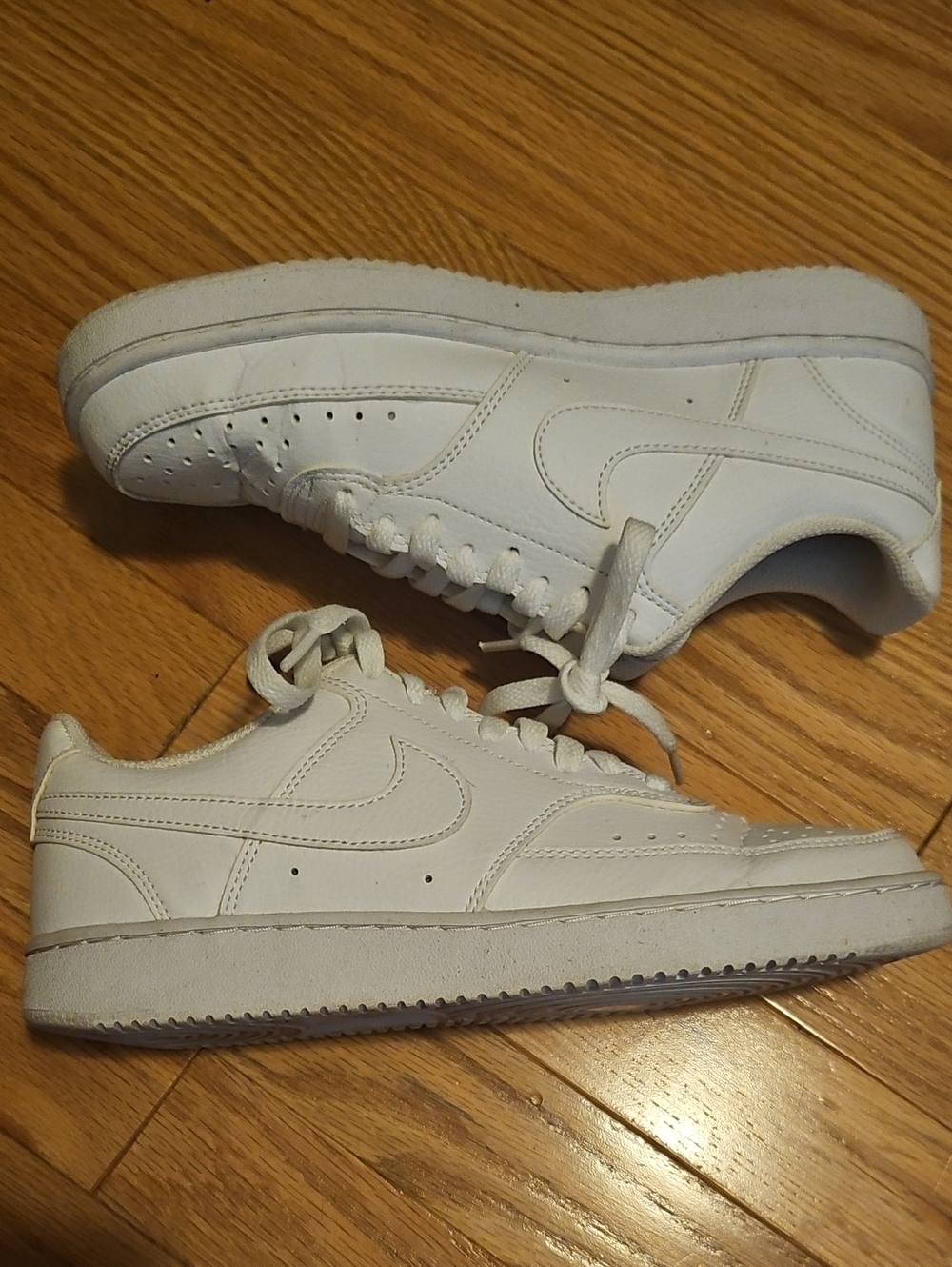 Nike Women’s All-White Low-Top Leather Sneakers